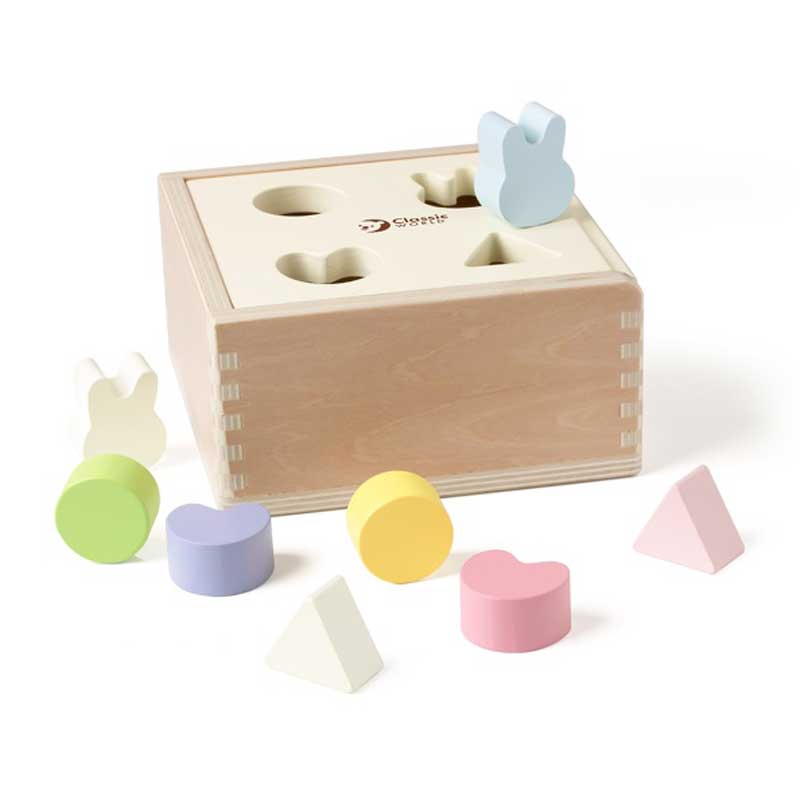 Wooden shape sorter box in pastel colors