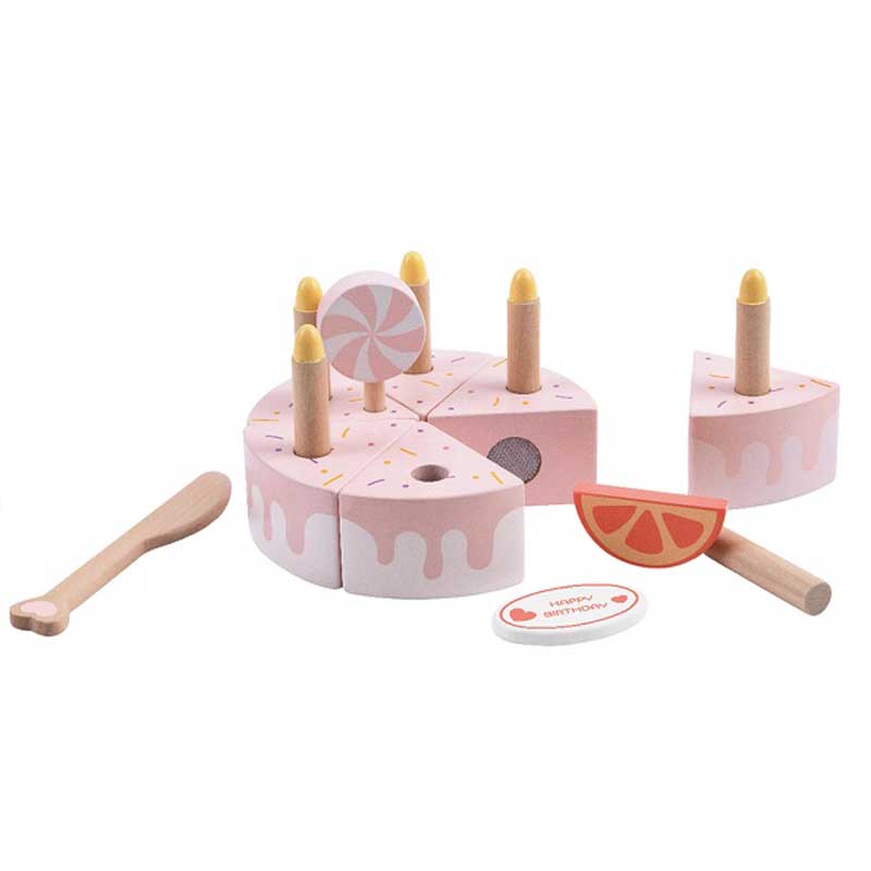 Children's wooden cake with candles in pastel pink